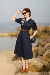 a lady in a denim top and a denim skirt